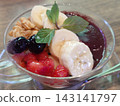 Yogurt topped with acai and blueberry sauce 143141797