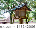 A small wooden building located within the grounds of Izumo Taisha Shrine. 143142086