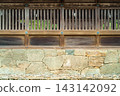 Vertical planking and stonework seen in the wooden architecture of Izumo Taisha Shrine 143142092