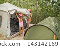 A children's camping camp on the lake shore. 143142169
