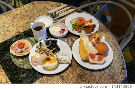 Dining Room Buffet aboard the abstract luxury cruise ship. Healthy food at modern liner concept Dining Room Buffet aboard the abstract luxury cruise ship. Healthy food at modern liner concept 143143896