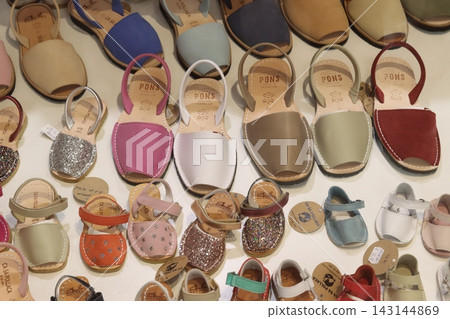 Colorful avarcas menorcan sandals on display in shop Colorful avarcas menorcan sandals on display in shop 143144869