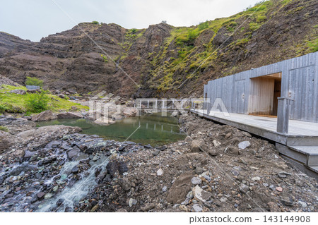 Natural hot spring pool near Husafell in Iceland Natural hot spring pool near Husafell in Iceland 143144908