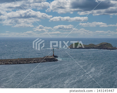 Aerial view of Lofoten coastline with beacon and white lighthouse Aerial view of Lofoten coastline with beacon and white lighthouse 143145447