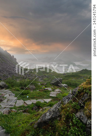 Stone hiking trail on Floya mountain above Svolvaer, Lofoten Stone hiking trail on Floya mountain above Svolvaer, Lofoten 143145794