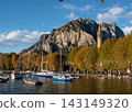 Autumn Landscape of Lake Como in Lecco with Sailboats and Mountains at Sunset 143149320