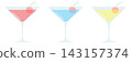 A cocktail topped with a cherry 143157374
