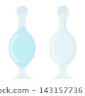 A small glass bottle containing blue liquid and an empty bottle 143157736