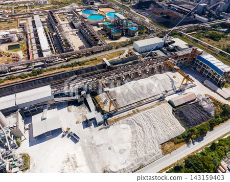 Industrial site with storage and processing area in a manufacturing location 143159403