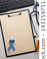 Prostate Cancer Awareness Ribbon with Medical Equipment 143159751