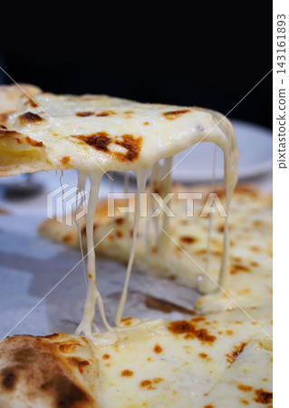 Crispy thin crust gorgonzola cheese pizza served with sweet honey Crispy thin crust gorgonzola cheese pizza served with sweet honey 143161893