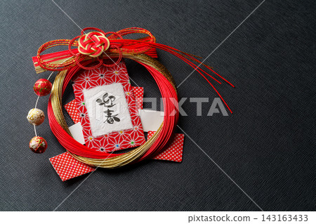 New Year's decorations using mizuhiki (decorative cords) against a black background New Year's decorations using mizuhiki (decorative cords) against a black background 143163433