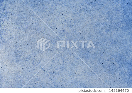 Plaster wall, blue stucco concrete texture background with speckled pattern, grainy surface Plaster wall, blue stucco concrete texture background with speckled pattern, grainy surface 143164470
