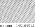 Close up, macro white knitted fabric texture with diagonal yarn stitches, cloth wool background 143164518