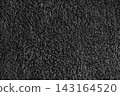 Macro of black microfiber bath towel, soft fluffy fabric, absorbent material texture background 143164520