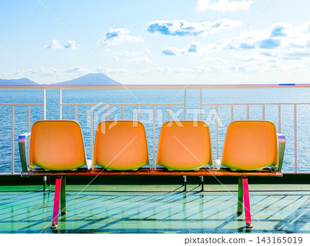 A scene with benches, enjoying a boat trip from Takamatsu Port to Tonosho on Shodoshima Island in early autumn. A scene with benches, enjoying a boat trip from Takamatsu Port to Tonosho on Shodoshima Island in early autumn. 143165019