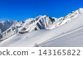 The Northern Alps in the late snow season: Hakuba Sanzan and vast snow slopes bathed in morning light. 143165822