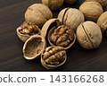 Walnuts in their shells 143166268