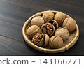 Walnuts in their shells 143166271