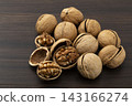 Walnuts in their shells 143166274