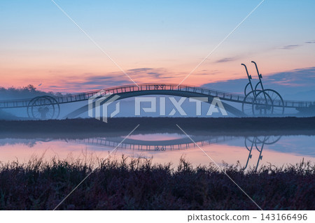 Sunrise Dawn over Misaeng Bridge with Water Reflection in Siheung Wetland, South Korea Sunrise Dawn over Misaeng Bridge with Water Reflection in Siheung Wetland, South Korea 143166496