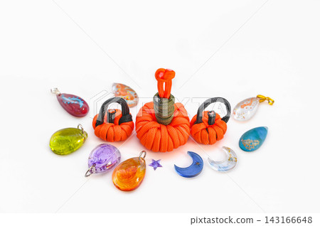Pumpkins made from paracord and colorful resin charms Pumpkins made from paracord and colorful resin charms 143166648