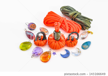 Pumpkins made from paracord and colorful resin charms Pumpkins made from paracord and colorful resin charms 143166649