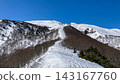 The snow-capped Mt. Iwaki, the ridge known as "Dragon's Tail" and the silvery ridgeline as seen from Obaishi. 143167760