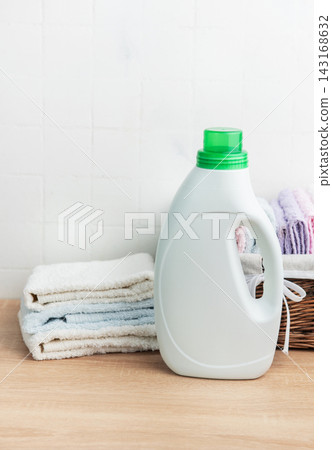 Detergent bottle, laundry and clean fresh towels Detergent bottle, laundry and clean fresh towels 143168632