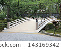 bridge over garden pond 143169342