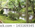 A river flowing through a Japanese garden 143169345