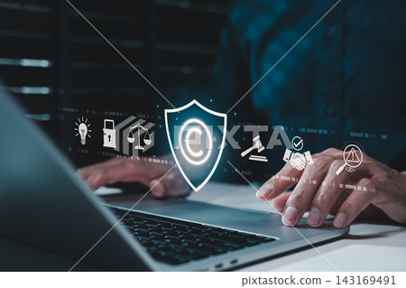 Copyright protection concept. Person using laptop and copyright icon with legal, security, and intellectual property symbols, representing creative rights, trademark law and digital content ownership. 143169491