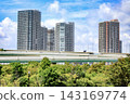 A view of the tower apartment buildings in Shinonome, Tokyo, across Tatsumi no Mori Seaside Park. 143169774