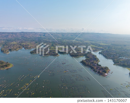 Aerial View of Serene Lake with Floating Fish Farms and Islands Aerial View of Serene Lake with Floating Fish Farms and Islands 143170007