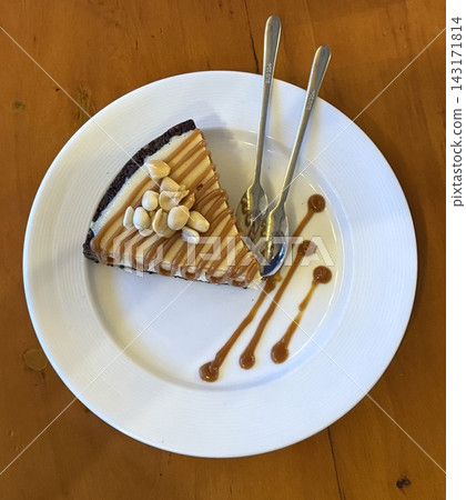 Cheesecake Slice with Chocolate Sauce Cheesecake Slice with Chocolate Sauce 143171814