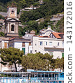 Famous town of Amalfi, located on the Amalfi Coast, with its azure sea and beautiful colorful houses. 143172016