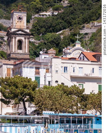 Famous town of Amalfi, located on the Amalfi Coast, with its azure sea and beautiful colorful houses. Famous town of Amalfi, located on the Amalfi Coast, with its azure sea and beautiful colorful houses. 143172016