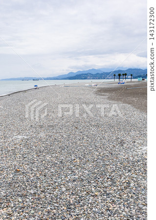 pebble beach in Batumi city on cloudy autumn day 143172300