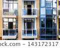 front view of balconies on facade of new building 143172317