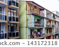 facades of apartment building on street in Batumi 143172318