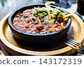 Georgian meat dish Ostri in ketsi pan close-up 143172319
