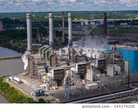 Aerial view of a large industrial energy power station complex 143174108