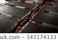 EV car service. Electric vehicle battery pack being serviced or inspected in automotive workshop. Large battery modules and high voltage components. Modern EV power systems. Lithium ion NMC NCA or LFP 143174133