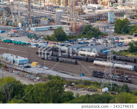 Telephoto aerial shot of heavy freight trains at industrial facility Telephoto aerial shot of heavy freight trains at industrial facility 143174635