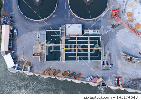Wide-angle aerial view of a circular water treatment plant Wide-angle aerial view of a circular water treatment plant 143174648