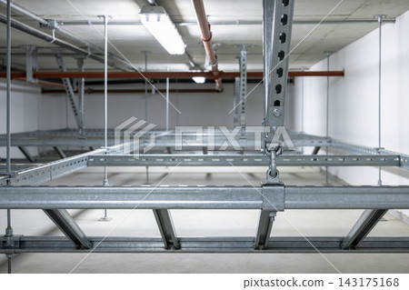Industrial ceiling infrastructure with galvanized steel support beams and utility piping systems Industrial ceiling infrastructure with galvanized steel support beams and utility piping systems 143175168
