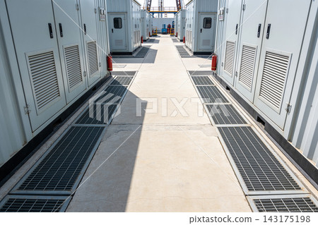 Industrial power generator units arranged in rows at a modern energy production facility site Industrial power generator units arranged in rows at a modern energy production facility site 143175198