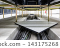 Raised floor system with exposed cabling infrastructure inside a modern data center facility 143175268