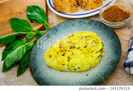 Keptas varskes suris su ciberzole. Fried cheese curds with turmeric Keptas varskes suris su ciberzole. Fried cheese curds with turmeric 143176319