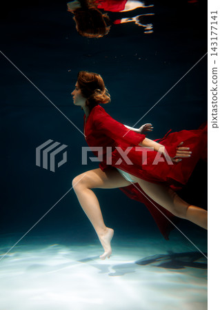 Calm underwater scene with reflective ambiance and soft glow Calm underwater scene with reflective ambiance and soft glow 143177141